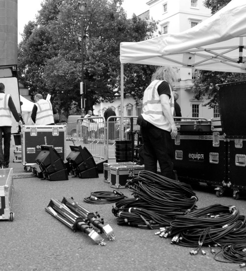 Events crew for equip with cables, road boxes and a van.