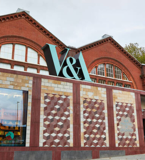 Exterior of the Young V&A museum with large logo sign.